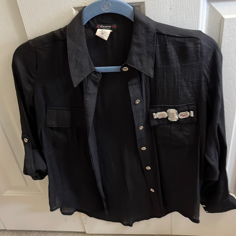 Black blouse -six buttons two pockets One with rhinestones excellent condition